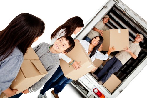 Furniture removal team preparing items for a move in Denmark