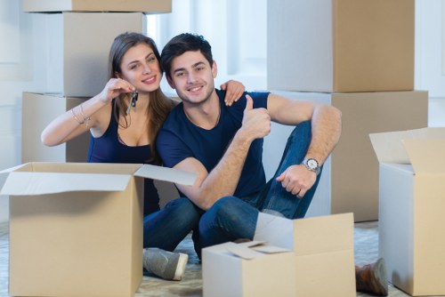 Moving team handling boxes during a Denmark removals service