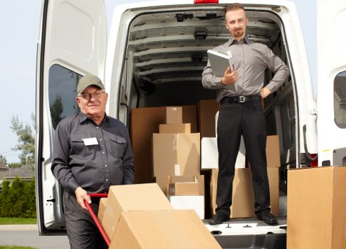 Packed moving boxes and furniture prepared for Denmark removals