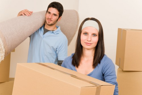 Moving day logistics in Denmark with labeled boxes and furniture